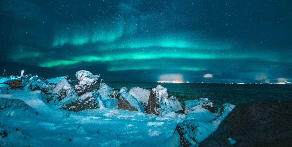 Aurores boréales, ciel bleu vert Reykjavik, Islande